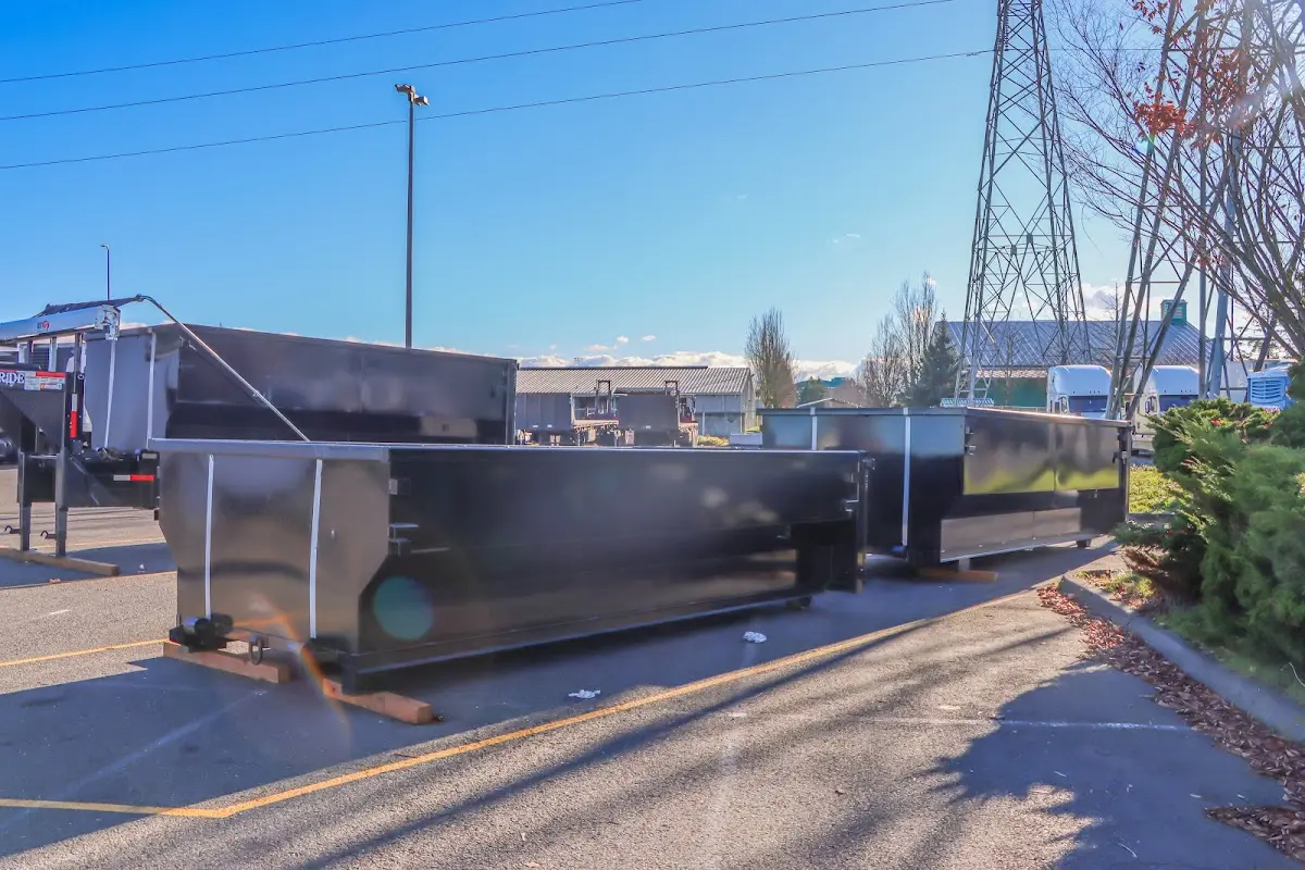 Roll-off dumpster ready for waste disposal at job site for Yard Waste Dumpster Rental in Finley